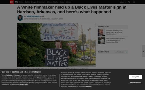 A White filmmaker held up a Black Lives Matter sign in ...